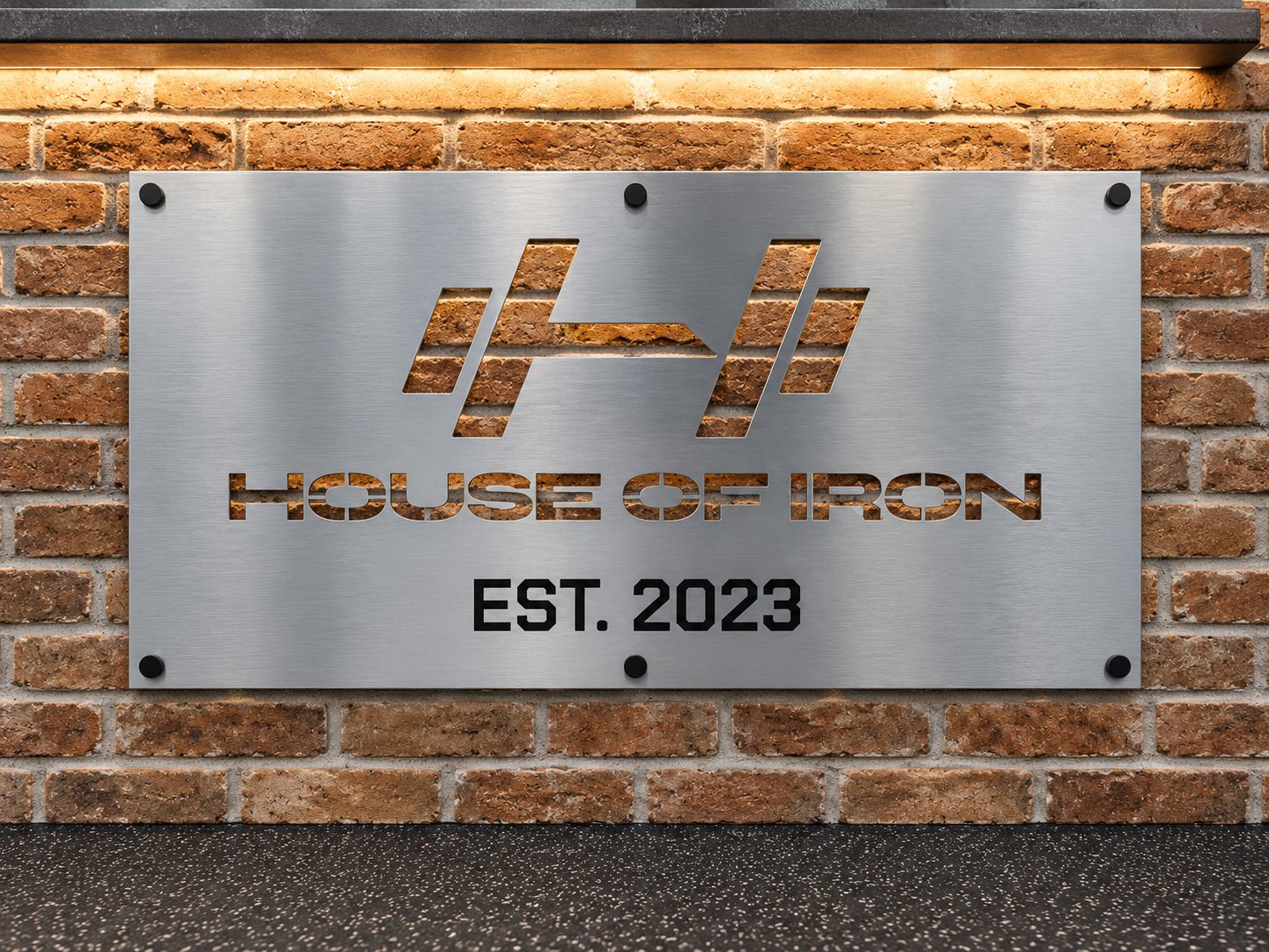 Brick reception desk and arrival path at House of Iron Downtown